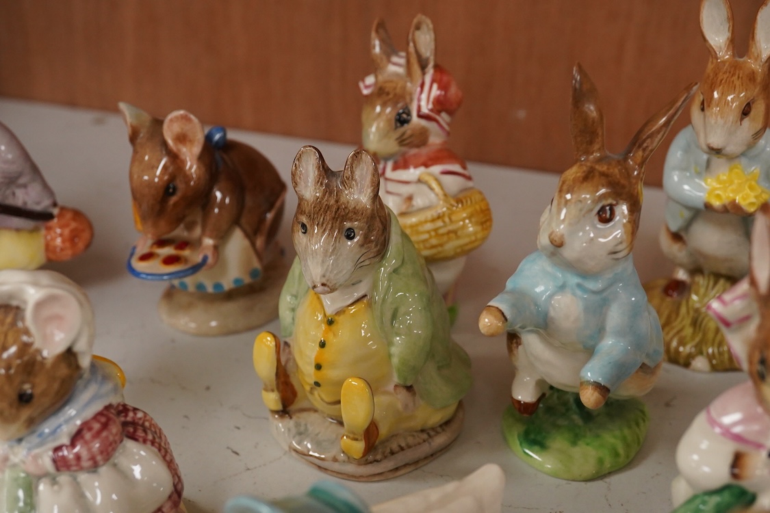 Twenty Beatrix Potter figures, mostly later production figures, largest 11cm high